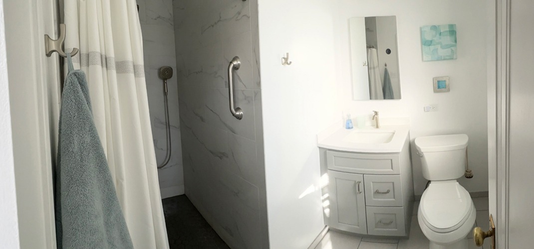 Small space, big style! Featuring Moen, Kohler, Bertch Bath, and Landmark Ceramics in a beautifully efficient bathroom remodel.